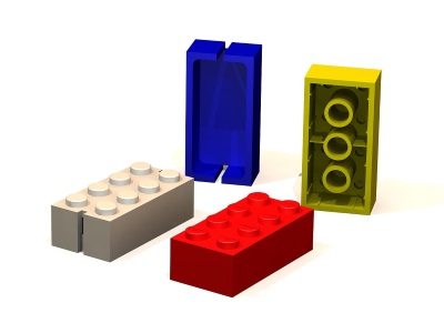 Legosteine wie 1949 und in moderner Version, erst ohne, dann mit Innenrhren